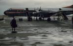 <span class="caption-caption">Electra aeroplane at airport, Eagle Farm</span>, 1960. <br />Slide, collection of <span class="caption-contributor">Richard Hopkins</span>.