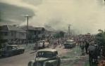 <span class="caption-caption">Martin family's house on fire, Redcliffe</span>, 1961. <br />Slide, collection of <span class="caption-contributor">Richard Hopkins</span>.