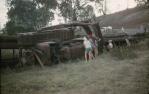 <span class="caption-caption">Bulldozer capsized in Burnett River, Eidsvold Shire</span>, 1961. <br />Slide, collection of <span class="caption-contributor">Richard Hopkins</span>.