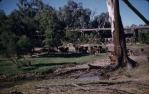 <span class="caption-caption">Bridge crossing of Dawson River at Moura Weir, with remains of old trestle bridge</span>, 1961. <br />Slide, collection of <span class="caption-contributor">Richard Hopkins</span>.