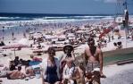 <span class="caption-caption">Beach on a Sunday, Surfers Paradise</span>, 1962. <br />Slide, collection of <span class="caption-contributor">Richard Hopkins</span>.