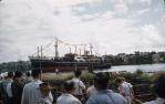 <span class="caption-caption">Tugs take Kangaroo to the fitting-out berth, Kangaroo Point</span>, 1962. <br />Slide, collection of <span class="caption-contributor">Richard Hopkins</span>.