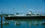 <span class="caption-caption">HMS Brittania, Queen's apartments at the rear, Hamilton in background</span>, 1963. <br />Slide, collection of <span class="caption-contributor">Richard Hopkins</span>.