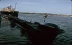 <span class="caption-caption">Submarine berthed at Bretts Wharf, Hamilton</span>, 1964. <br />Slide, collection of <span class="caption-contributor">Richard Hopkins</span>.