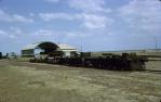 <span class="caption-caption">Railway Station "Gulflander" and old rail wheels, Normanton</span>, 1966. <br />Slide, collection of <span class="caption-contributor">Richard Hopkins</span>.