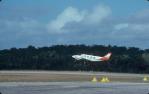 <span class="caption-caption">Navaho Chieftan takes off from Lockhart River airstrip</span>, 1982. <br />Slide, collection of <span class="caption-contributor">Ruth Read</span>.