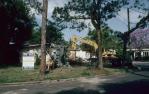 <span class="caption-caption">Beginning of demolition, Sovereign Street, Indooroopilly</span>, 2003. <br />Slide, collection of <span class="caption-contributor">Ruth Read</span>.