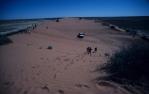<span class="caption-caption">Exploring Big Red, the sand dune west from Birdsville</span>, 1995. <br />Slide, collection of <span class="caption-contributor">Ruth Read</span>.
