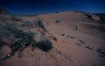 <span class="caption-caption">Exploring Big Red, the sand dune west from Birdsville</span>, 1995. <br />Slide, collection of <span class="caption-contributor">Ruth Read</span>.