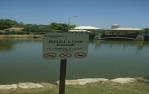 <span class="caption-caption">Lake signs, Springfield Lakes</span>, 2005. <br />Slide, collection of <span class="caption-contributor">Terry White</span>.