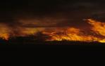 <span class="caption-caption">Sugar cane fire at sunset outside Ayr</span>, 1992. <br />Slide by <span class="caption-publisher">Michael Keniger</span>, collection of <span class="caption-contributor">University of Queensland Library</span>.