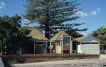 <span class="caption-caption">Beachfront elevation, Cleveland Point House, Cleveland</span>, 1991. <br />Slide by <span class="caption-publisher">Michael Keniger</span>, collection of <span class="caption-contributor">University of Queensland Library</span>.