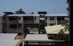 <span class="caption-caption">North (rear) elevation and driveway, public housing, Cotton Tree Housing Estate, Maroochydore</span>, 1996. <br />Slide by <span class="caption-publisher">Michael Keniger</span>, collection of <span class="caption-contributor">University of Queensland Library</span>.