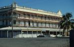 <span class="caption-caption">Street elevation, former Commercial Hotel and Chambers, Rockhampton</span>, 1979. <br />Slide by <span class="caption-publisher">Michael Keniger</span>, collection of <span class="caption-contributor">University of Queensland Library</span>.