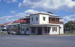 <span class="caption-caption">Corner store and house, Rockhampton</span>, 1979. <br />Slide by <span class="caption-publisher">Michael Keniger</span>, collection of <span class="caption-contributor">University of Queensland Library</span>.
