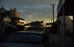 <span class="caption-caption">Streetscape at sunset, Charters Towers</span>, 1986. <br />Slide by <span class="caption-publisher">Michael Keniger</span>, collection of <span class="caption-contributor">University of Queensland Library</span>.