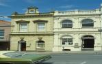 <span class="caption-caption">Offices Streetscape, Gympie</span>, 1979. <br />Slide by <span class="caption-publisher">Michael Keniger</span>, collection of <span class="caption-contributor">University of Queensland Library</span>.
