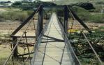 <span class="caption-caption">Pedestrian suspension bridge, Mount Morgan</span>, 1986. <br />Slide by <span class="caption-publisher">Michael Keniger</span>, collection of <span class="caption-contributor">University of Queensland Library</span>.