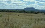 <span class="caption-caption">Landscape outside Springsure</span>, 1986. <br />Slide by <span class="caption-publisher">Michael Keniger</span>, collection of <span class="caption-contributor">University of Queensland Library</span>.