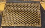 <span class="caption-caption">Metal grate in street, Normanton</span>, 1986. <br />Slide by <span class="caption-publisher">Michael Keniger</span>, collection of <span class="caption-contributor">University of Queensland Library</span>.