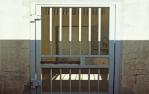 <span class="caption-caption">Jail cell door, Normanton</span>, 1986. <br />Slide by <span class="caption-publisher">Michael Keniger</span>, collection of <span class="caption-contributor">University of Queensland Library</span>.