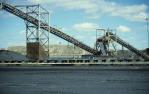 <span class="caption-caption">Coal mine conveyors, Moura</span>, 1986. <br />Slide by <span class="caption-publisher">Michael Keniger</span>, collection of <span class="caption-contributor">University of Queensland Library</span>.