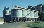 <span class="caption-caption">Approach to agricultural storage silos, Dalby</span>, 1979. <br />Slide by <span class="caption-publisher">Michael Keniger</span>, collection of <span class="caption-contributor">University of Queensland Library</span>.