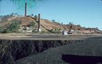 <span class="caption-caption">Remains of state smelters and slag heap, Chillagoe</span>, 1984. <br />Slide, collection of <span class="caption-contributor">Warwick Willmott</span>.