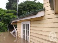 <span class="caption-caption">Flood water rises to the windows of this Graceville house, 13 January 2011</span>. <br />Digital image, collection of <span class="caption-contributor">Rachel Bastin</span>.