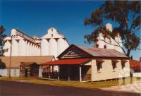<span class="caption-caption">Old shire office and peanut silos</span>, 2003. <br />Photograph, collection of <span class="caption-contributor">John Young</span>.