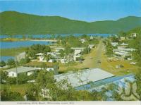 <span class="caption-caption">Overlooking Airlie Beach</span>, c1970. <br />Postcard folder by <span class="caption-publisher">Murray Views Pty Ltd</span>, collection of <span class="caption-contributor">Centre for the Government of Queensland</span>.