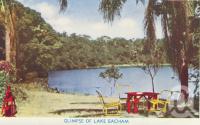 <span class="caption-caption">Glimpse of Lake Eacham</span>, c1950. <br />Postcard folder by <span class="caption-publisher">Murray Views Pty Ltd</span>, collection of <span class="caption-contributor">Centre for the Government of Queensland</span>.