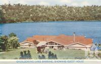 <span class="caption-caption">Overlooking Lake Barrine, showing guest house</span>, c1950. <br />Postcard folder by <span class="caption-publisher">Murray Views Pty Ltd</span>, collection of <span class="caption-contributor">Centre for the Government of Queensland</span>.