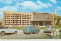 <span class="caption-caption">City Council Chambers, Bourbong Street Bundaberg</span>, c1958. <br />Postcard folder by <span class="caption-publisher">Murray Views Pty Ltd</span>, collection of <span class="caption-contributor">Centre for the Government of Queensland</span>.