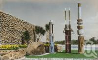 <span class="caption-caption">Aboriginal Poles, Lennons Broadbeach Hotel</span>, c1960. <br />Postcard by <span class="caption-publisher">Kodak</span>, collection of <span class="caption-contributor">Centre for the Government of Queensland</span>.