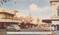 <span class="caption-caption">Kent Street from Town Hall Corner, Maryborough</span>, c1950. <br />Postcard folder by <span class="caption-publisher">Murray Views Pty Ltd</span>, collection of <span class="caption-contributor">Centre for the Government of Queensland</span>.