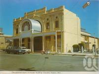 <span class="caption-caption">Stock Exchange Building, Charters Towers</span>, c1972. <br />Postcard folder by <span class="caption-publisher">Murray Views Pty Ltd</span>, collection of <span class="caption-contributor">Centre for the Government of Queensland</span>.