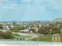 <span class="caption-caption">Overlooking the town from Buckland Hill, Charters Towers</span>, c1972. <br />Postcard folder by <span class="caption-publisher">Murray Views Pty Ltd</span>, collection of <span class="caption-contributor">Centre for the Government of Queensland</span>.