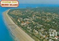 <span class="caption-caption">Aerial view of Woorim, Bribie Island</span>, c1980. <br />Postcard by <span class="caption-publisher">Bernard Kuskopf</span>, collection of <span class="caption-contributor">Centre for the Government of Queensland</span>.