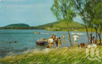 <span class="caption-caption">Water ski-ing on the lake at the causeway, Emu Park</span>, c1975. <br />Postcard by <span class="caption-publisher">Murray Views Pty Ltd</span>, collection of <span class="caption-contributor">Centre for the Government of Queensland</span>.