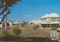 <span class="caption-caption">Herbert Street, Bowen</span>, c1980. <br />Postcard folder by <span class="caption-publisher">Murray Views Pty Ltd</span>, collection of <span class="caption-contributor">Centre for the Government of Queensland</span>.