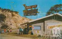 <span class="caption-caption">The Chairlift, Mermaid Beach</span>, c1966. <br />Postcard by <span class="caption-publisher">Murray Views Pty Ltd</span>, collection of <span class="caption-contributor">Centre for the Government of Queensland</span>.