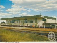 <span class="caption-caption">Quilpie Railway Station</span>, c1962. <br />Postcard folder by <span class="caption-publisher">Murray Views Pty Ltd</span>, collection of <span class="caption-contributor">Centre for the Government of Queensland</span>.
