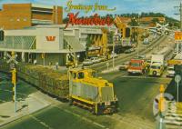 <span class="caption-caption">Cane train, Nambour</span>, c1984. <br />Postcard by <span class="caption-publisher">Bernard Kuskopf</span>, collection of <span class="caption-contributor">Centre for the Government of Queensland</span>.