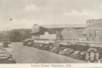 <span class="caption-caption">Currie Street, Nambour</span>, c1960. <br />Postcard folder by <span class="caption-publisher">Murray Views Pty Ltd</span>, collection of <span class="caption-contributor">Centre for the Government of Queensland</span>.