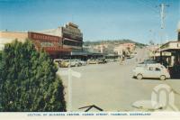 <span class="caption-caption">Section of business centre, Currie Street, Nambour</span>, c1958. <br />Postcard folder by <span class="caption-publisher">Sydney G Hughes Pty Ltd</span>, collection of <span class="caption-contributor">Centre for the Government of Queensland</span>.