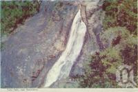 <span class="caption-caption">Tully Falls near Ravenshoe</span>, c1960. <br />Postcard folder by <span class="caption-publisher">Murray Views Pty Ltd</span>, collection of <span class="caption-contributor">Centre for the Government of Queensland</span>.