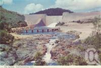 <span class="caption-caption">The spillway, Koombooloomba Dam, south of Ravenshoe</span>, c1960. <br />Postcard folder by <span class="caption-publisher">Murray Views Pty Ltd</span>, collection of <span class="caption-contributor">Centre for the Government of Queensland</span>.