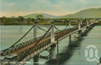 <span class="caption-caption">Fitzroy Bridge, Rockhampton</span>, 1911. <br />Postcard by <span class="caption-publisher">Coloured Shell Series</span>, collection of <span class="caption-contributor">Centre for the Government of Queensland</span>.