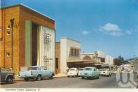 <span class="caption-caption">Goondoon Street, Gladstone</span>, c1960. <br />Postcard folder by <span class="caption-publisher">Murray Views Pty Ltd</span>, collection of <span class="caption-contributor">Centre for the Government of Queensland</span>.